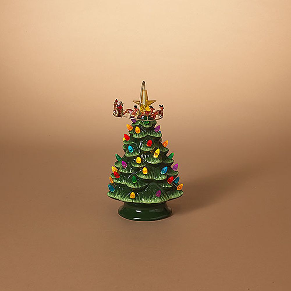 Gerson 10" B/O Lighted Ceramic Holiday Christmas Tree with Rotating Sleigh