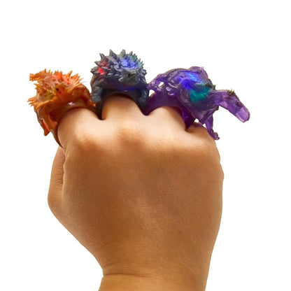 Two's Company Flashing Dinosaur 48-Pcs Puppet Ring with Display in 6 Designs
